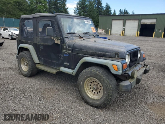 1998 Jeep Wrangler Sport z VIN 1J4FY19S7WP801709, wystawiony jako Copart lot #64495985 z przebiegiem 260 798 mil mil oraz Czysty tytuł • Clean title. Historia ofert i sprzedaży dostępna na DreamBid. Obrazek 4.