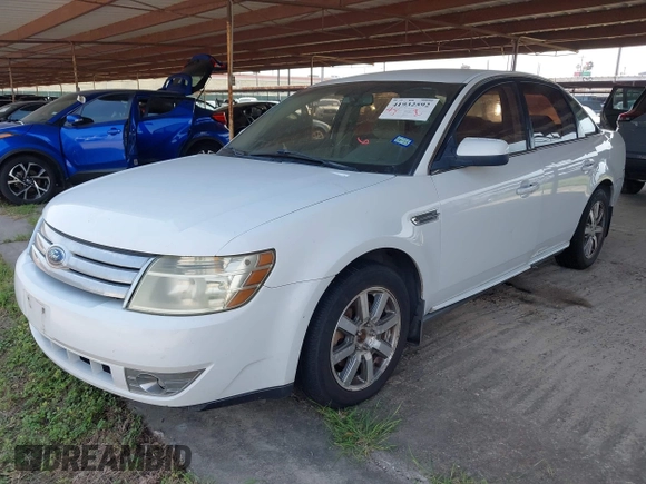 2008 Ford Taurus SEL z VIN 1FAHP24W68G143505, wystawiony jako IAAI lot #41932592 z przebiegiem 238 542 mil mil oraz . Historia ofert i sprzedaży dostępna na DreamBid. Obrazek 2.
