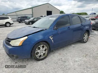2008 Ford Focus SE z VIN 1FAHP35NX8W249103, wystawiony jako Copart lot #57782035 z przebiegiem 210 666 mil mil oraz Szkoda całkowita • Salvage title. Historia ofert i sprzedaży dostępna na DreamBid. Obrazek 1.
