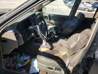 1993 Jeep Grand Cherokee Limited with VIN 1J4GZ78S3PC502345, listed as a Copart auction lot 46933805 with 121,652 mi miles and Salvage title. Bid and sale history available at DreamBid. Image 7.