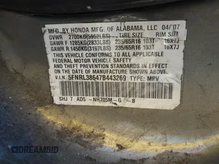 2007 Honda Odyssey EX-L z VIN 5FNRL38647B443269, wystawiony jako IAAI lot #42316300 z przebiegiem 121 616 mil mil oraz . Historia ofert i sprzedaży dostępna na DreamBid. Obrazek 9.