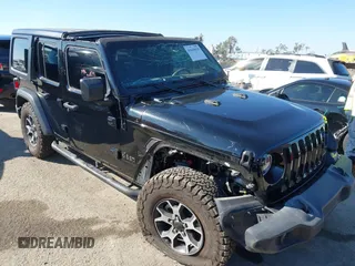 2023 Jeep Wrangler Willys z VIN 1C4HJXDN0PW597768, wystawiony jako IAAI lot #41645815 z przebiegiem 23 717 mil mil oraz . Historia ofert i sprzedaży dostępna na DreamBid. Obrazek 1.