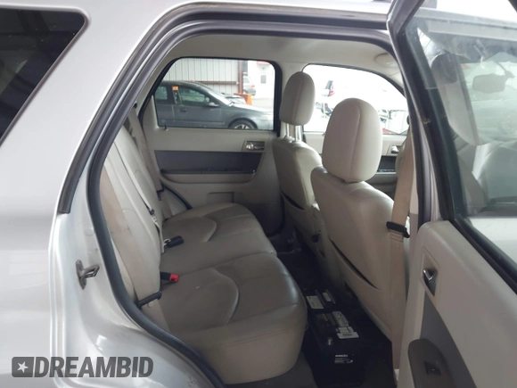 2011 Mercury Mariner Premier with VIN 4M2CN9HG3BKJ08263, listed as a IAAI auction lot 41942213 with 181,041 mi miles and . Bid and sale history available at DreamBid. Image 8.