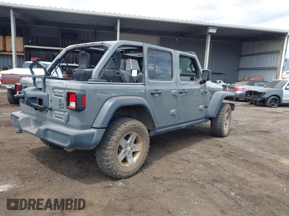 2021 Jeep Wrangler Unlimited Willys with VIN 1C4HJXDGXMW763324, listed as a IAAI auction lot 41643296 with 22,599 mi miles and . Bid and sale history available at DreamBid. Image 4.