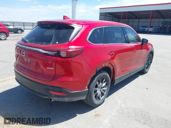 2016 Mazda CX-9 Touring with VIN JM3TCBCY5G0104504, listed as a IAAI auction lot 42314649 with 116,536 mi miles and . Bid and sale history available at DreamBid. Image 4.