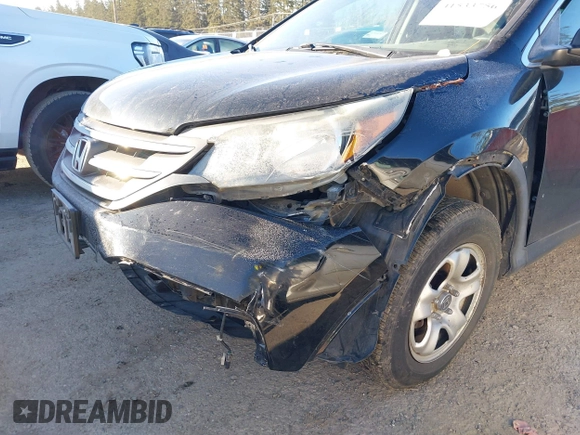 2014 Honda CR-V LX with VIN 3CZRM3H33EG701074, listed as a IAAI auction lot 41533756 with 127,928 mi miles. Bid and sale history available at carsss.com. Image 6.