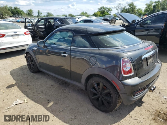 2015 MINI Coupe S z VIN WMWSX3C55FT409449, wystawiony jako Copart lot #66574174 z przebiegiem 99 155 mil mil oraz Szkody całkowita. Historia ofert i sprzedaży dostępna na DreamBid. Obrazek 2.