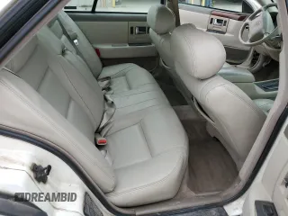 1997 Cadillac Seville Luxury SLS z VIN 1G6KS52Y0VU819998, wystawiony jako Copart lot #55979335 z przebiegiem 87 054 mil mil oraz Szkoda całkowita • Salvage title. Historia ofert i sprzedaży dostępna na DreamBid. Obrazek 10.
