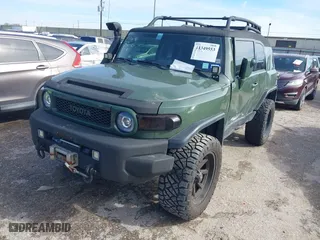 2014 Toyota FJ Cruiser with VIN JTEBU4BFXEK192640, listed as a IAAI auction lot 41349553 with 49,308 mi miles. Bid and sale history available at carsss.com. Image 17.