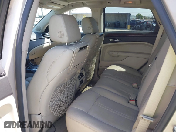 2011 Cadillac SRX Premium Collection z VIN 3GYFNCEY3BS506360, wystawiony jako IAAI lot #42096225 z przebiegiem 173 514 mil mil oraz . Historia ofert i sprzedaży dostępna na DreamBid. Obrazek 8.