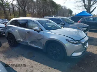 2023 Mazda CX-9 Touring Plus с VIN JM3TCBAY1P0648632, выставлен на аукционе IAAI как лот 42019152 с пробегом 15 383 миль миль и . История ставок и продаж доступна на DreamBid. Изображение 12.