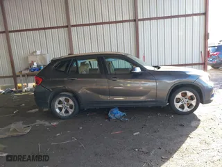 2013 BMW X1 28i with VIN WBAVM1C53DVW43228, listed as a IAAI auction lot 41301776 with 61,323 mi miles. Bid and sale history available at carsss.com. Image 13.