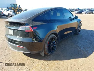 2022 Tesla Model Y Performance with VIN 7SAYGDEFXNF313636, listed as a IAAI auction lot 41660019 with 30,258 mi miles and . Bid and sale history available at DreamBid. Image 4.