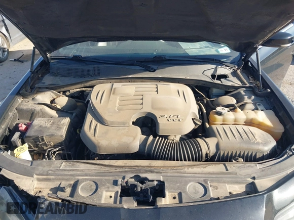 2013 Chrysler 300 with VIN 2C3CCABG7DH573164, listed as a IAAI auction lot 41851066 with 218,234 mi miles. Bid and sale history available at carsss.com. Image 10.