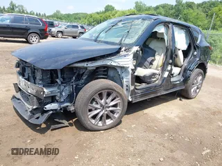 2020 Mazda CX-5 Grand Touring с VIN JM3KFADM2L0731972, выставлен на аукционе IAAI как лот 42686202 с пробегом Не указан миль и . История ставок и продаж доступна на DreamBid. Изображение 2.
