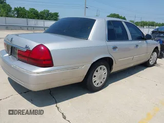 2004 Mercury Grand Marquis GS z VIN 2MEFM74W54X673359, wystawiony jako IAAI lot #42441171 z przebiegiem 117 442 mil mil oraz . Historia ofert i sprzedaży dostępna na DreamBid. Obrazek 4.