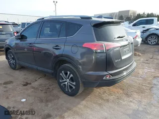 2018 Toyota RAV4 LE with VIN JTMZFREV4JJ183106, listed as a IAAI auction lot 41449468 with 114,719 mi miles. Bid and sale history available at carsss.com. Image 3.