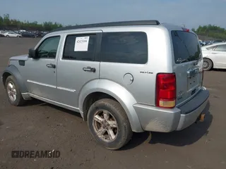 2010 Dodge Nitro SXT z VIN 1D4PU5GK8AW146087, wystawiony jako IAAI lot #42423104 z przebiegiem 220 381 mil mil oraz . Historia ofert i sprzedaży dostępna na DreamBid. Obrazek 3.