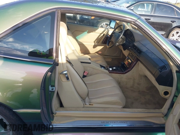 1990 Mercedes-Benz 500 z VIN WDBFA66E7LF005953, wystawiony jako IAAI lot #42224846 z przebiegiem 87 388 mil mil oraz . Historia ofert i sprzedaży dostępna na DreamBid. Obrazek 5.