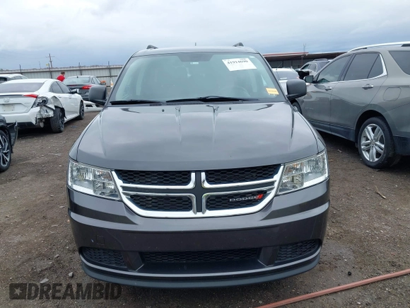 2017 Dodge Journey SE with VIN 3C4PDCAB9HT603595, listed as a IAAI auction lot 41914690 with 104,960 mi miles and . Bid and sale history available at DreamBid. Image 12.
