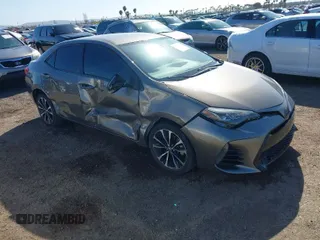 2017 Toyota Corolla L z VIN 2T1BURHE5HC830590, wystawiony jako IAAI lot #41809452 z przebiegiem 115 560 mil mil oraz . Historia ofert i sprzedaży dostępna na DreamBid. Obrazek 1.