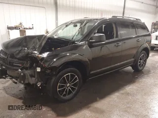 2017 Dodge Journey SE z VIN 3C4PDCAB4HT695490, wystawiony jako IAAI lot #41301719 z przebiegiem 103 642 mil mil oraz . Historia ofert i sprzedaży dostępna na DreamBid. Obrazek 2.