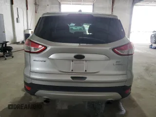 2013 Ford Escape SE with VIN 1FMCU0GX3DUD66890, listed as a Copart auction lot 86477264 with 142,722 mi miles and Salvage Title. Bid and sale history available at DreamBid. Image 6.