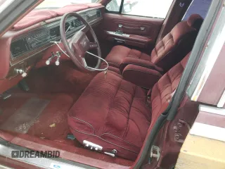 1987 Ford Crown Victoria z VIN 2FABP79F7HX228617, wystawiony jako Copart lot #82165434 z przebiegiem 99 456 mil mil oraz Szkody całkowita. Historia ofert i sprzedaży dostępna na DreamBid. Obrazek 7.