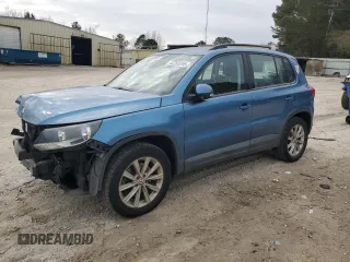 2017 Volkswagen Tiguan S with VIN WVGBV7AX2HK046312, listed as a Copart auction lot 42393295 with 94,814 mi miles and Salvage Title. Bid and sale history available at DreamBid. Image 1.