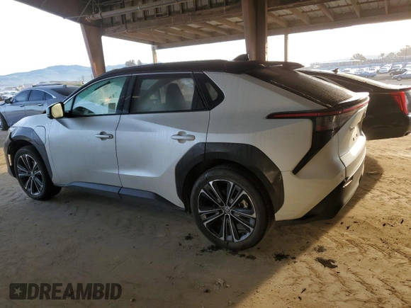 2023 Toyota bZ4X XLE with VIN JTMAAAAA7PA009698, listed as a Copart auction lot 47975935 with 15,916 mi miles and Salvage Title. Bid and sale history available at DreamBid. Image 2.