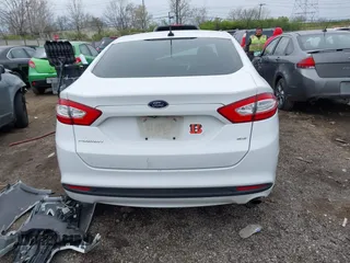 2016 Ford Fusion SE with VIN 1FA6P0H70G5105051, listed as a IAAI auction lot 42002630 with 178,851 mi miles. Bid and sale history available at carsss.com. Image 17.