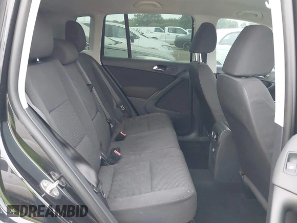 2013 Volkswagen Tiguan SE z VIN WVGAV7AXXDW519677, wystawiony jako IAAI lot #42264759 z przebiegiem 103 913 mil mil oraz . Historia ofert i sprzedaży dostępna na DreamBid. Obrazek 8.
