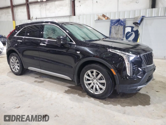 2020 Cadillac XT4 FWD Premium Luxury z VIN 1GYFZCR41LF143039, wystawiony jako Copart lot #57164005 z przebiegiem 24 218 mil mil oraz Nie do naprawy • Non repairable. Historia ofert i sprzedaży dostępna na DreamBid. Obrazek 4.