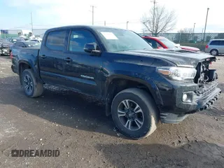 2019 Toyota Tacoma SR z VIN 3TMCZ5ANXKM200572, wystawiony jako IAAI lot #41504215 z przebiegiem 142 375 mil mil oraz . Historia ofert i sprzedaży dostępna na DreamBid. Obrazek 1.