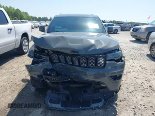 2020 Jeep Grand Cherokee Altitude with VIN 1C4RJEAG8LC391785, listed as a IAAI auction lot 42030302 with 55,622 mi miles and . Bid and sale history available at DreamBid. Image 12.