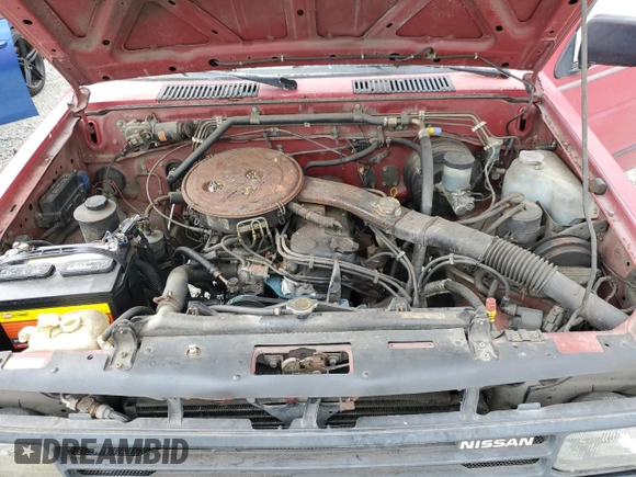 1989 Nissan Hardbody E z VIN 1N6ND16Y9KC352795, wystawiony jako Copart lot #72202814 z przebiegiem 242 396 mil mil oraz Tytuł czysty. Historia ofert i sprzedaży dostępna na DreamBid. Obrazek 11.