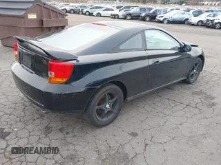 2000 Toyota Celica GTS with VIN JTDDY38T8Y0019336, listed as a IAAI auction lot 41643174 with 217,926 mi miles. Bid and sale history available at carsss.com. Image 4.