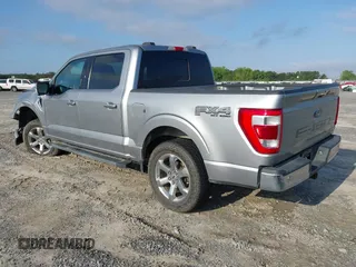 2021 Ford F-150 XL with VIN 1FTFW1E83MKD68308, listed as a IAAI auction lot 42137302 with 71,725 mi miles and . Bid and sale history available at DreamBid. Image 3.