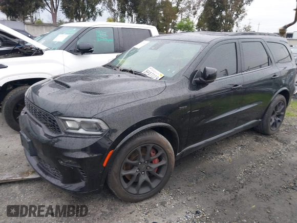 2023 Dodge Durango SRT 392 Premium with VIN 1C4SDJGJ6PC557943, listed as a IAAI auction lot 41478480 with 13,733 mi miles and . Bid and sale history available at DreamBid. Image 23.