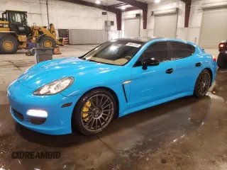 2012 Porsche Panamera S z VIN WP0AB2A77CL061256, wystawiony jako Copart lot #59347725 z przebiegiem 135 710 mil mil oraz Szkody całkowita. Historia ofert i sprzedaży dostępna na DreamBid. Obrazek 1.