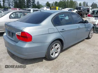 2008 BMW 3 Series 328i with VIN WBAVC53518F008938, listed as a IAAI auction lot 42150683 with 129,989 mi miles. Bid and sale history available at carsss.com. Image 4.