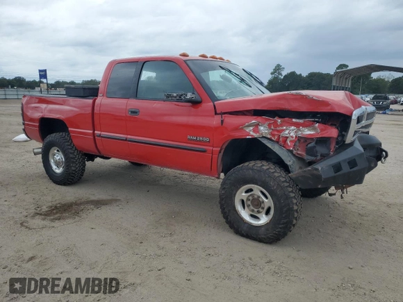 2000 Dodge 2500 with VIN 1B7KF236XYJ100955, listed as a Copart auction lot 70304884 with 250,592 mi miles and Salvage title. Bid and sale history available at DreamBid. Image 4.