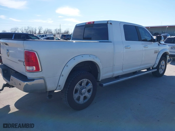 2015 Ram 2500 Laramie with VIN 3C6UR5NL4FG650906, listed as a IAAI auction lot 41657476 with 349,306 mi miles. Bid and sale history available at carsss.com. Image 4.