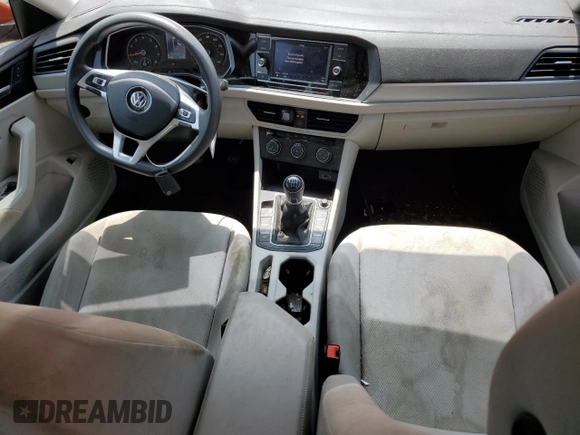 2019 Volkswagen Jetta S with VIN 3VWN57BU7KM090051, listed as a Copart auction lot 57095755 with 63,165 mi miles and Salvage title. Bid and sale history available at DreamBid. Image 8.
