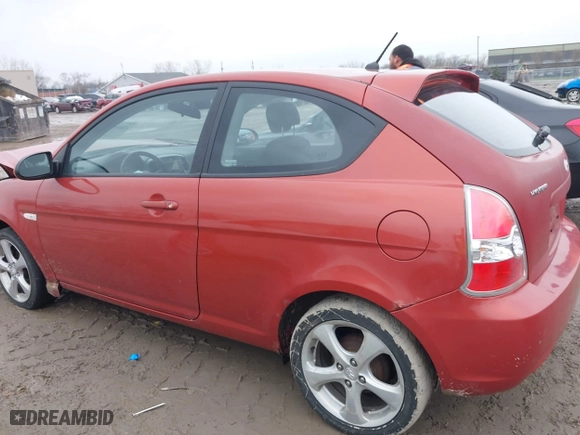 2008 Hyundai Accent SE with VIN KMHCN36C58U070319, listed as a IAAI auction lot 42010544 with 118,487 mi miles. Bid and sale history available at carsss.com. Image 13.