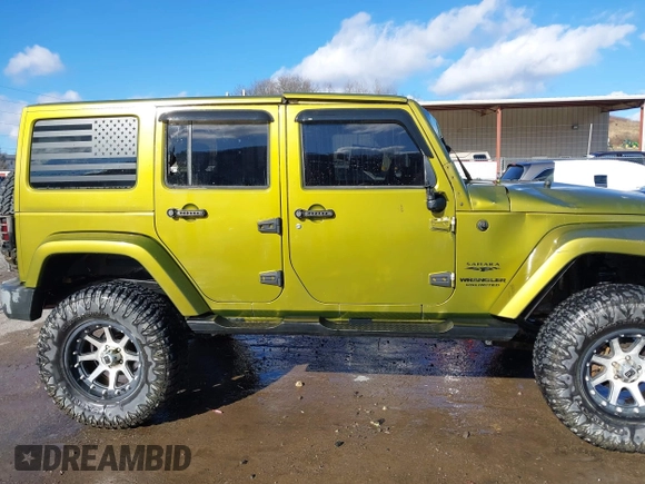 2007 Jeep Wrangler Unlimited Sahara with VIN 1J4GA59187L189519, listed as a IAAI auction lot 41204036 with 165,428 mi miles and . Bid and sale history available at DreamBid. Image 13.
