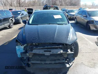 2016 Ford Fusion Titanium with VIN 3FA6P0K9XGR152837, listed as a IAAI auction lot 41647436 with 196,700 mi miles. Bid and sale history available at carsss.com. Image 12.