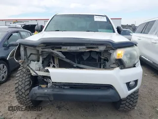 2013 Toyota Tacoma z VIN 5TFLU4EN2DX076815, wystawiony jako IAAI lot #41344839 z przebiegiem 311 083 mil mil oraz . Historia ofert i sprzedaży dostępna na DreamBid. Obrazek 12.