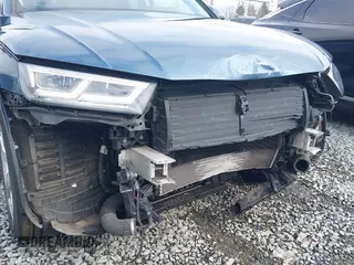 2018 Audi Q5 Premium Plus z VIN WA1BNAFY7J2010375, wystawiony jako IAAI lot #41751404 z przebiegiem 69 417 mil mil oraz . Historia ofert i sprzedaży dostępna na DreamBid. Obrazek 6.