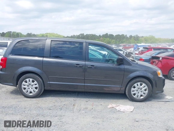 2016 Dodge Grand Caravan SE with VIN 2C4RDGBG2GR345965, listed as a IAAI auction lot 41955192 with 141,531 mi miles and . Bid and sale history available at DreamBid. Image 13.